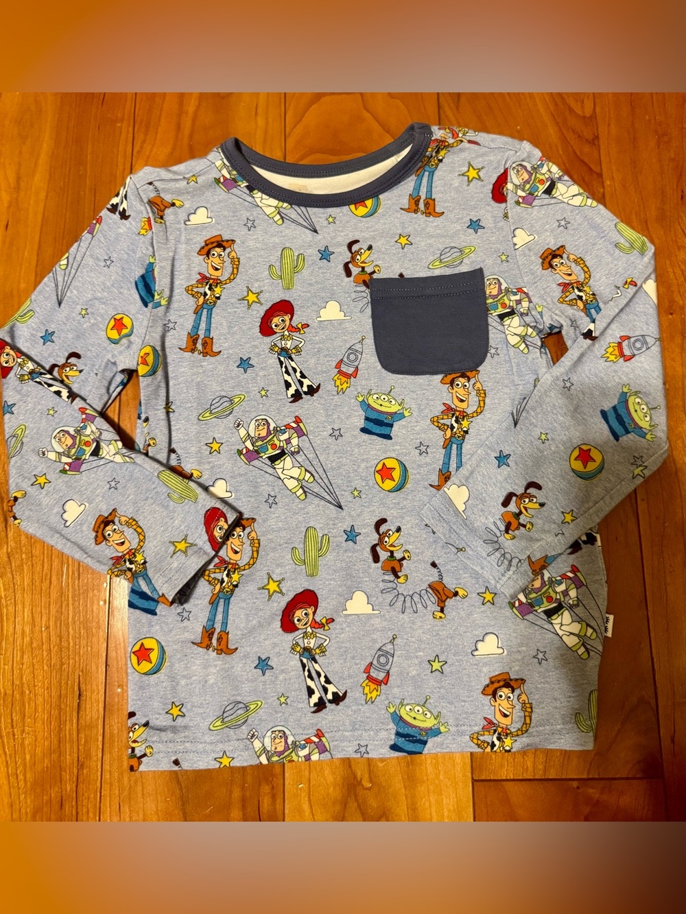 EUC Toy Story Characters Long-Sleeve Pocket Tee - Light Blue - Little Sleepies